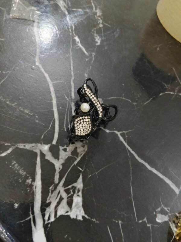 black metal hair catcher